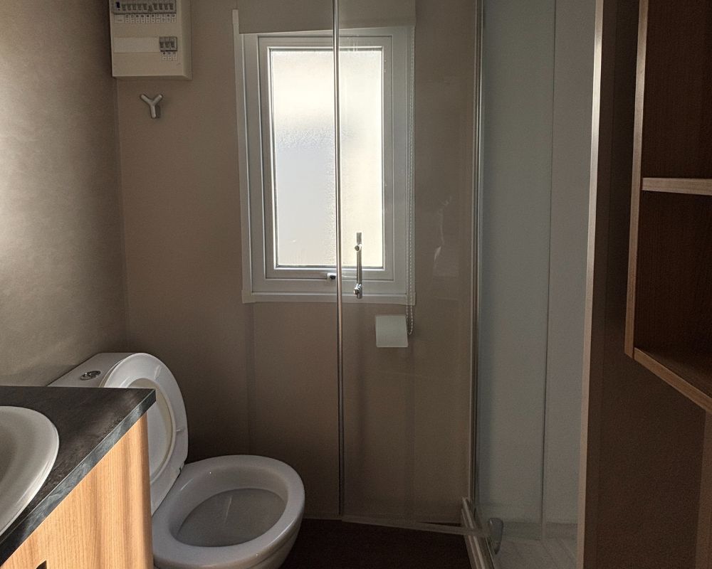 Mobil-home occasion Rapidhome Elite 100 3 chambres à vendre en Baie de Somme, salle d'eau