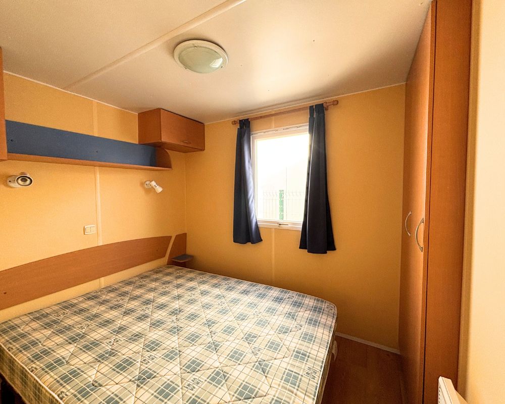 Mobil-home occasion super octalia bleu, quend, chambre parentale